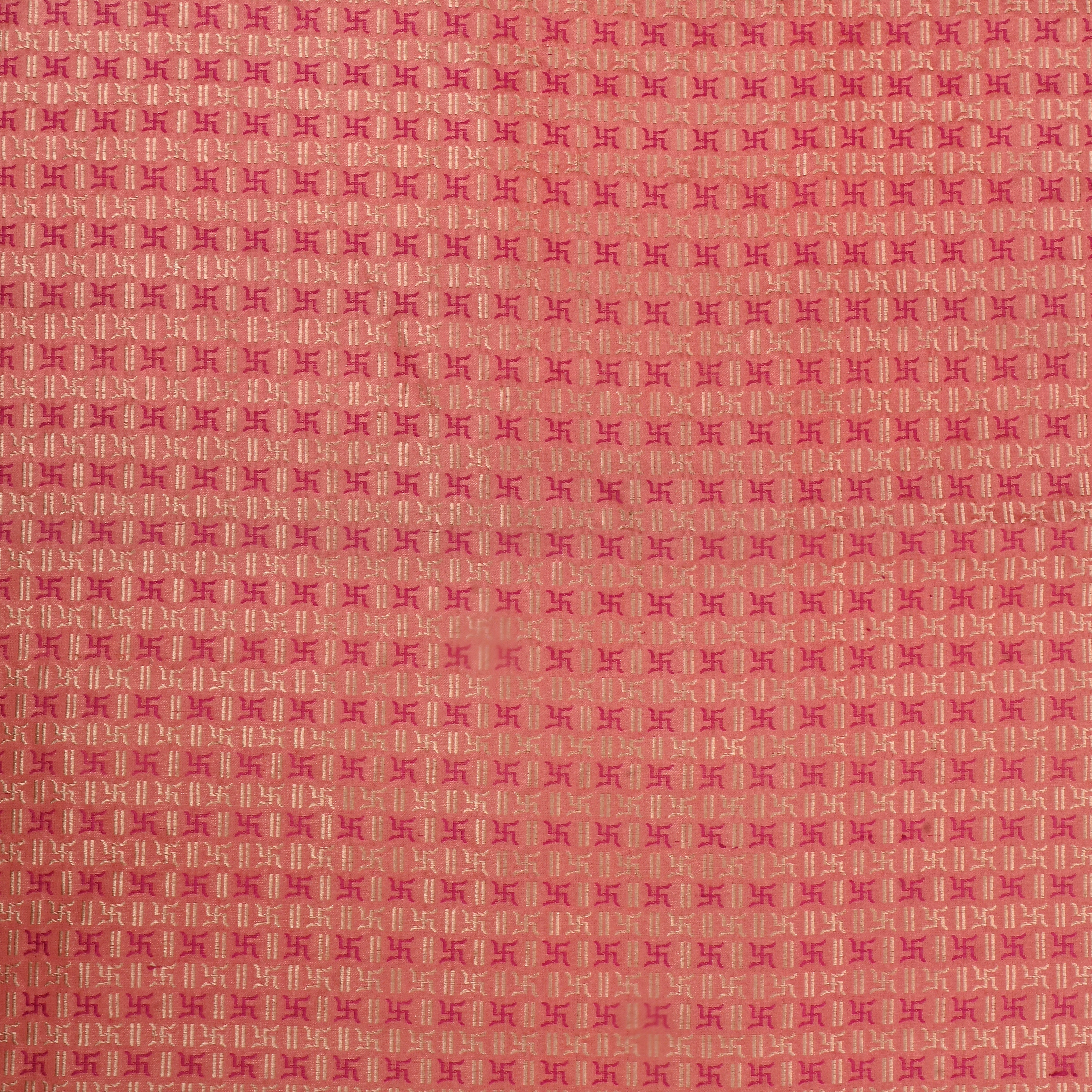 Peach Jamawar Satin Fabric With Swastika Symbols
