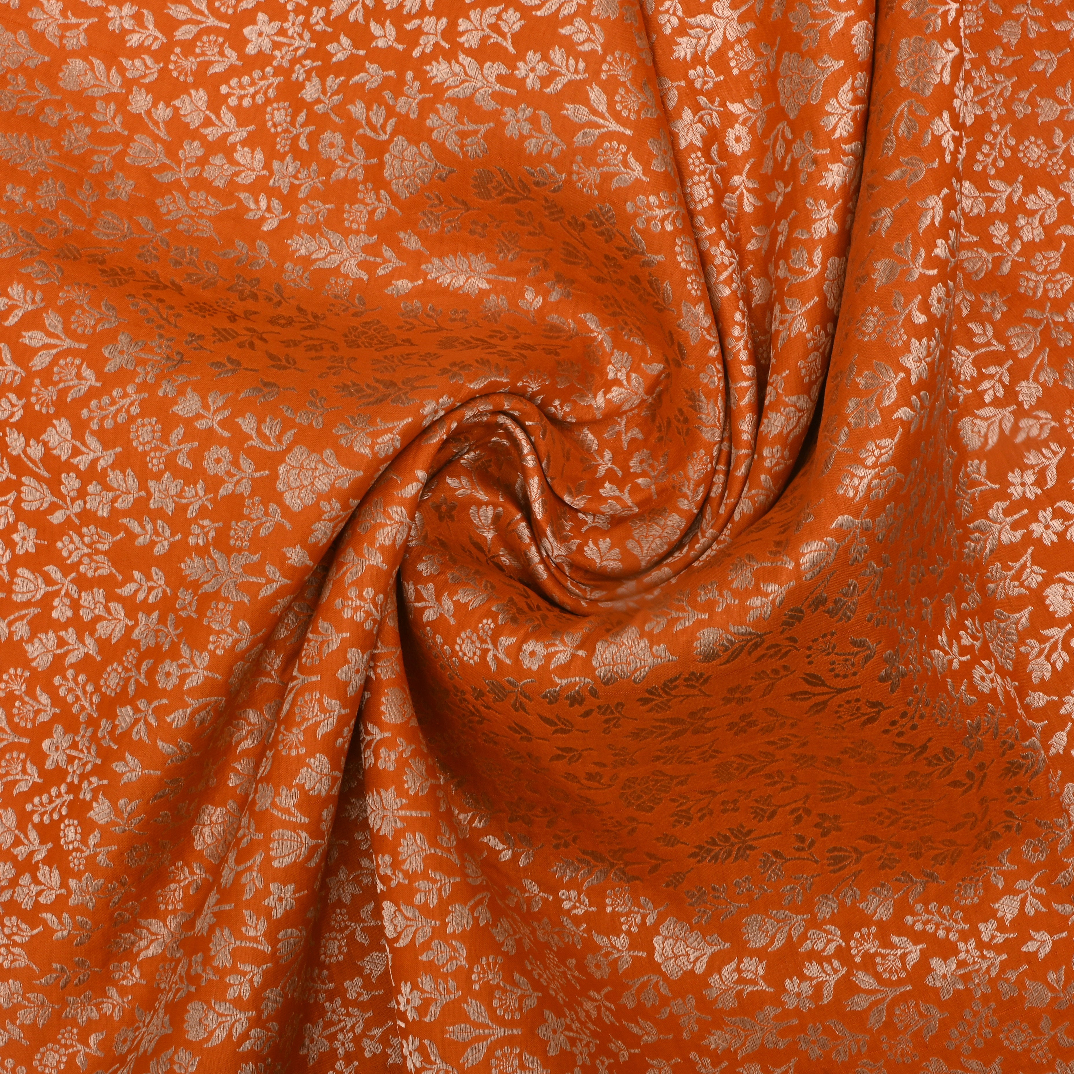 Bright Orange Jamawar Silk Fabric With Floral And Leaf Design