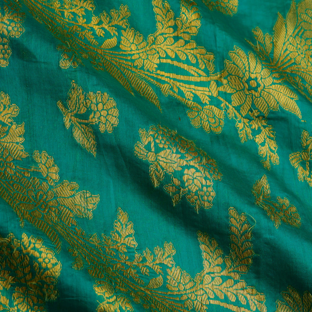 Teal Green Silk Fabric With Floral Patterns