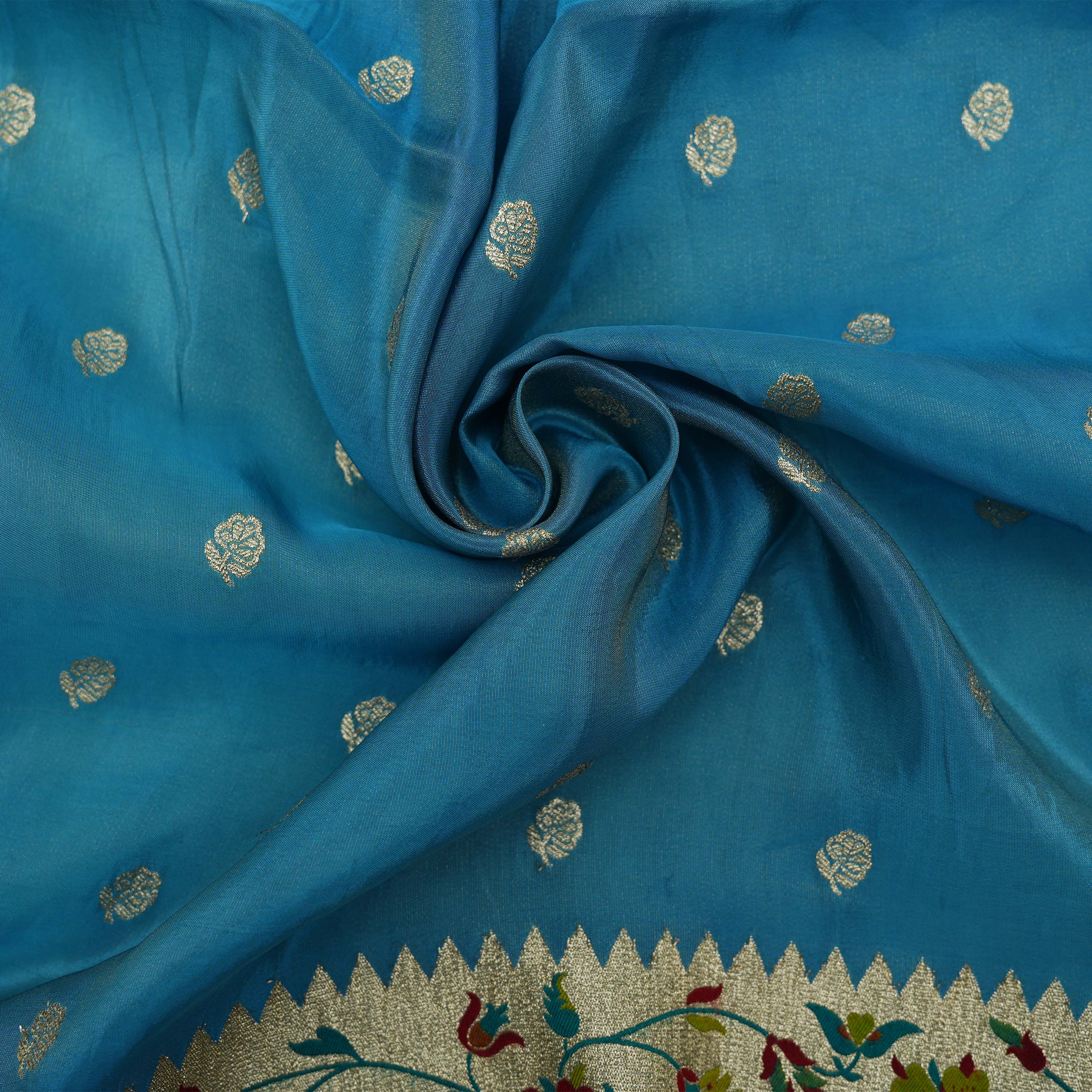 Deep Aqua Floral Buttis With Floral Jaal Border Tissue Fabric