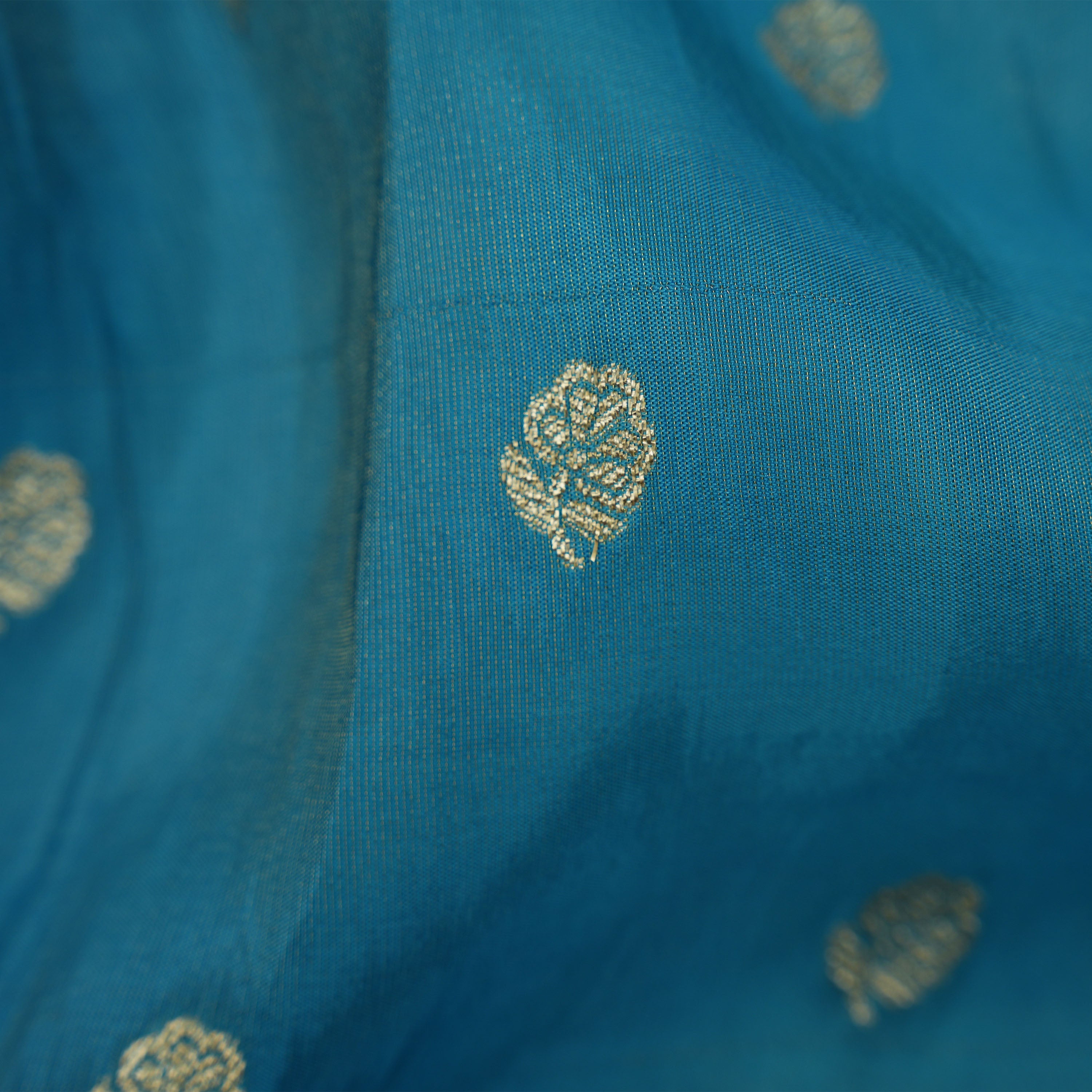 Deep Aqua Floral Buttis With Floral Jaal Border Tissue Fabric