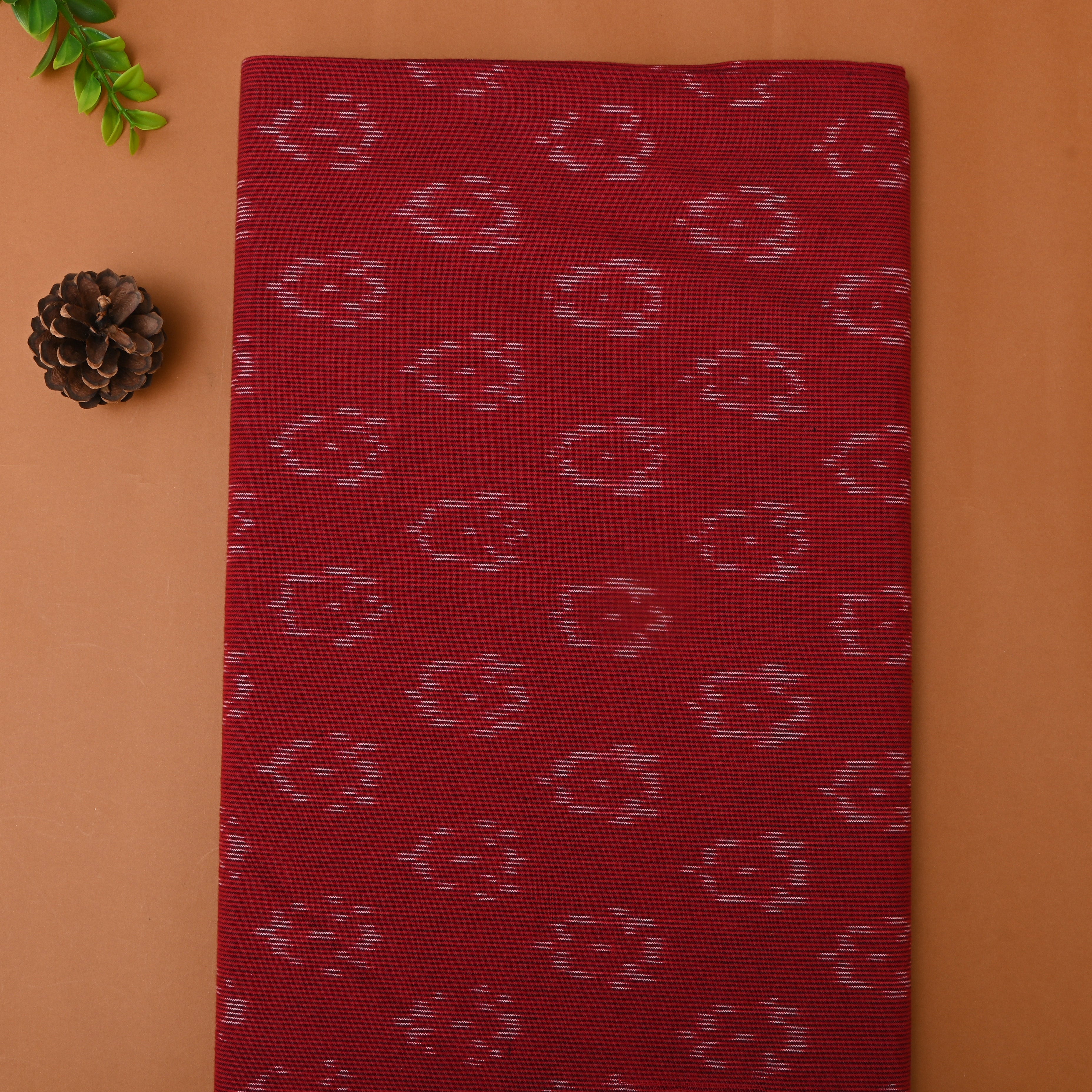 Reddish Maroon Ikat Cotton Fabric