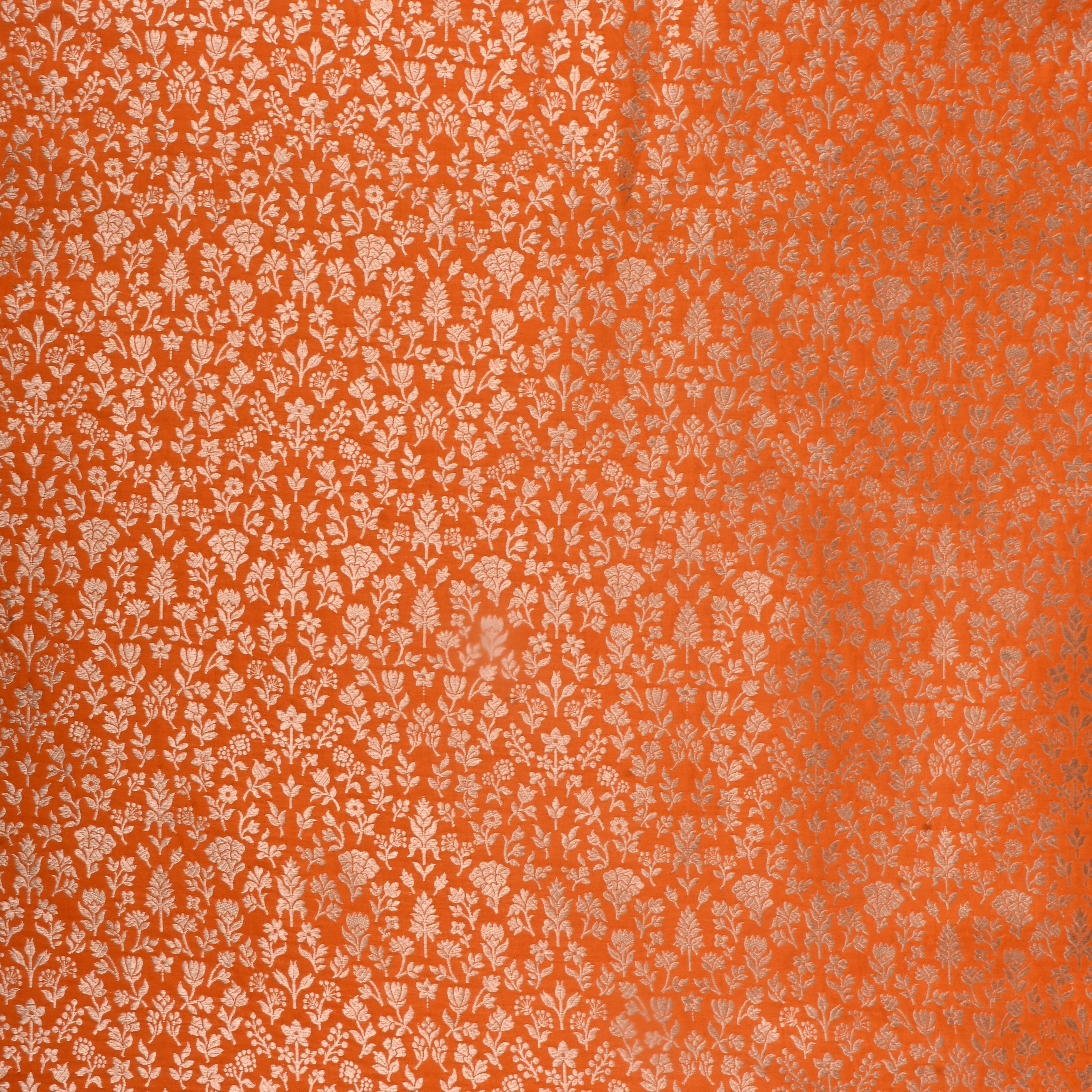 Bright Orange Jamawar Silk Fabric With Floral And Leaf Design