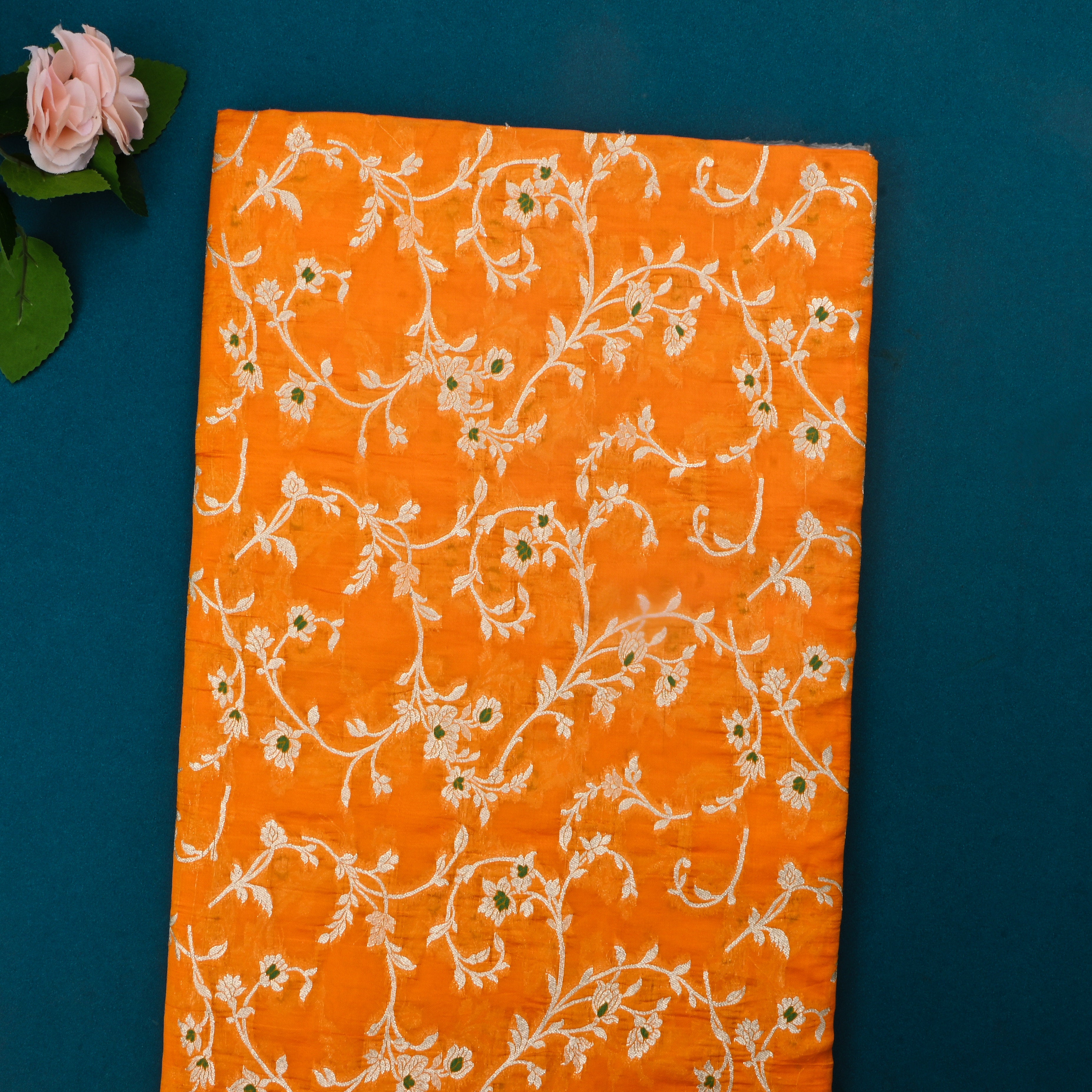 Pumpkin Orange Jamawar Silk Fabric With Floral Design