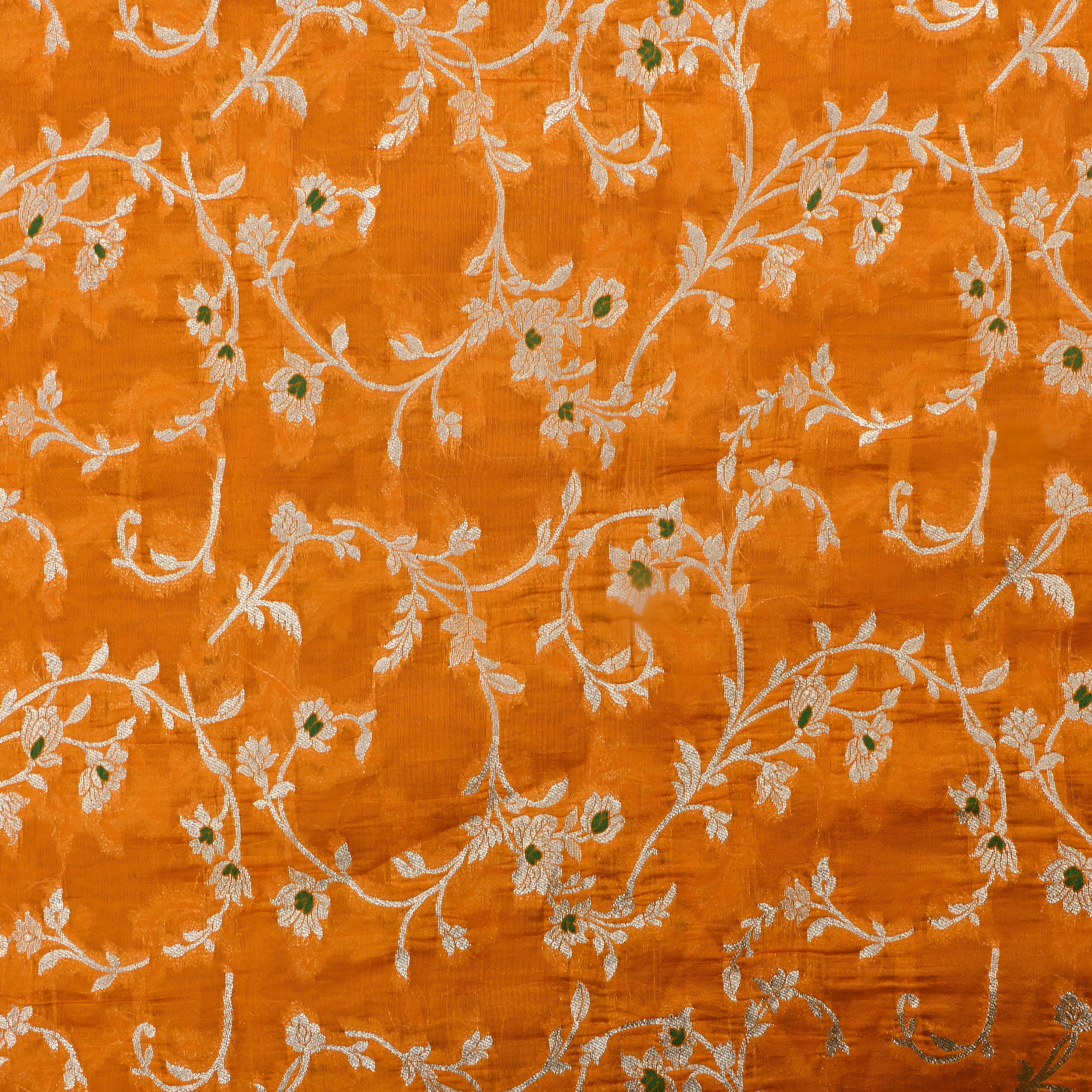 Pumpkin Orange Jamawar Silk Fabric With Floral Design