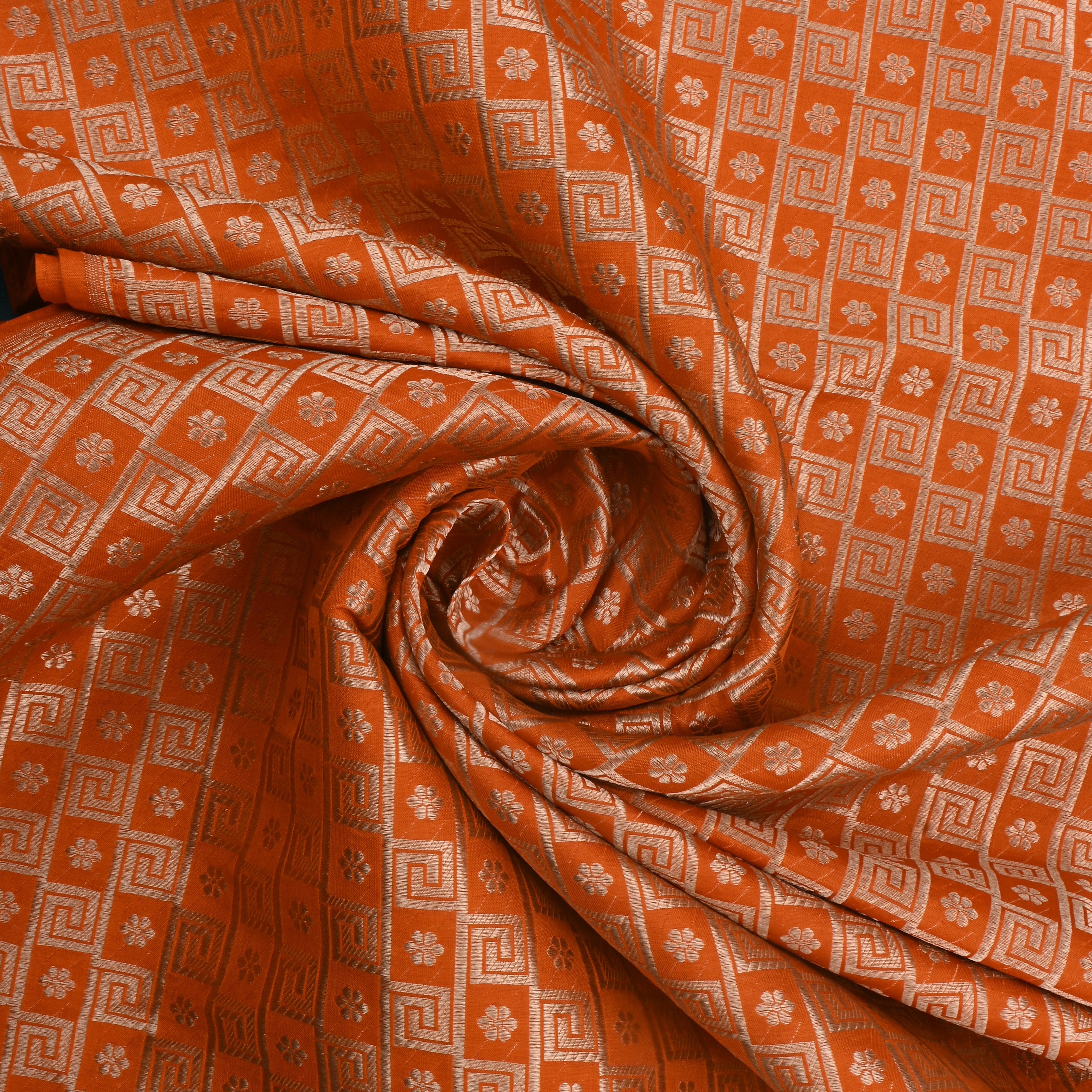 Halloween Orange Jamawar Silk Fabric With Geometrical And Floral Motifs