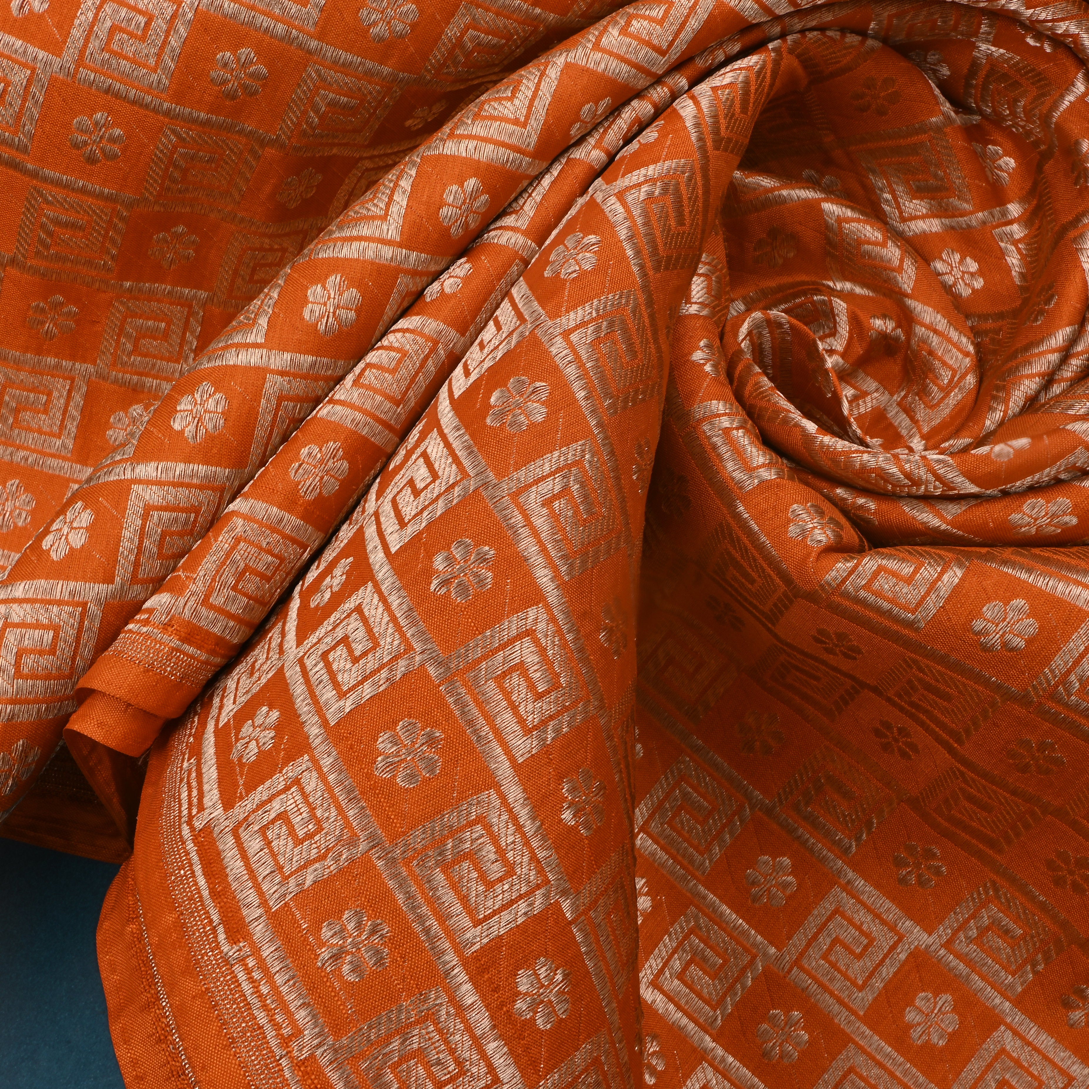 Halloween Orange Jamawar Silk Fabric With Geometrical And Floral Motifs