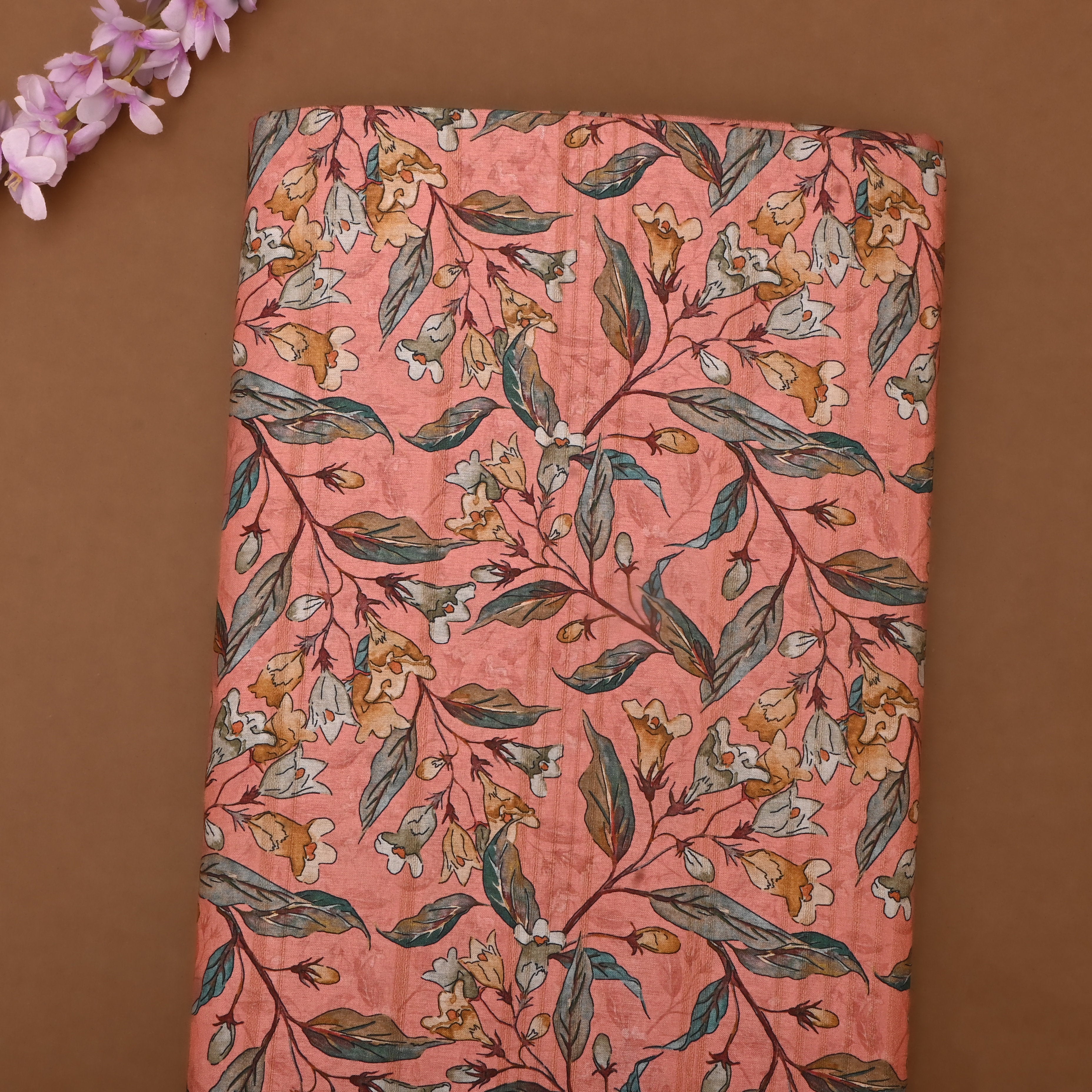 Peach Pink Tussar Fabric With Floral Prints