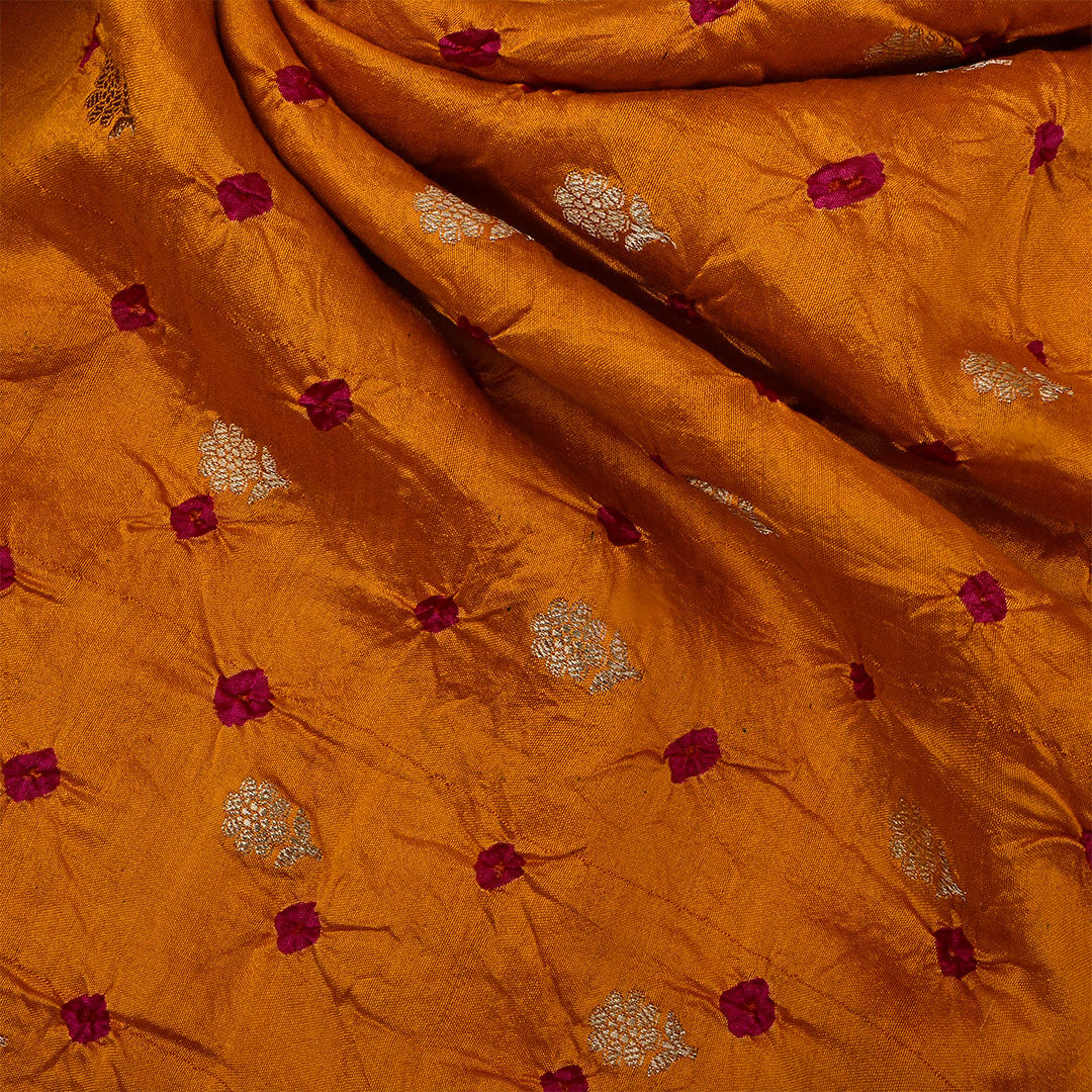 Rusty Orange Silk Bandhani Fabric With Floral Motifs