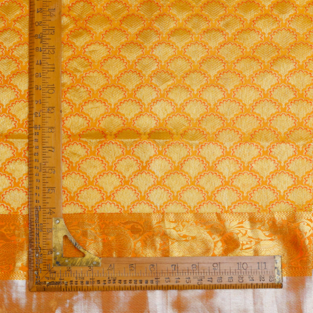 Vibrant Orange Color Silk Fabric With Floral Motif Pattern