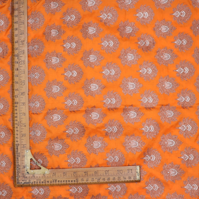 Fire Orange Color Jamavar Silk Fabric With Floral Buttas